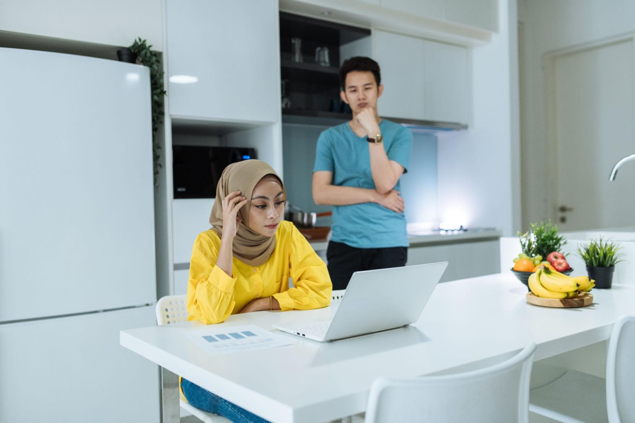 Professionals reviewing business charts in a meeting room